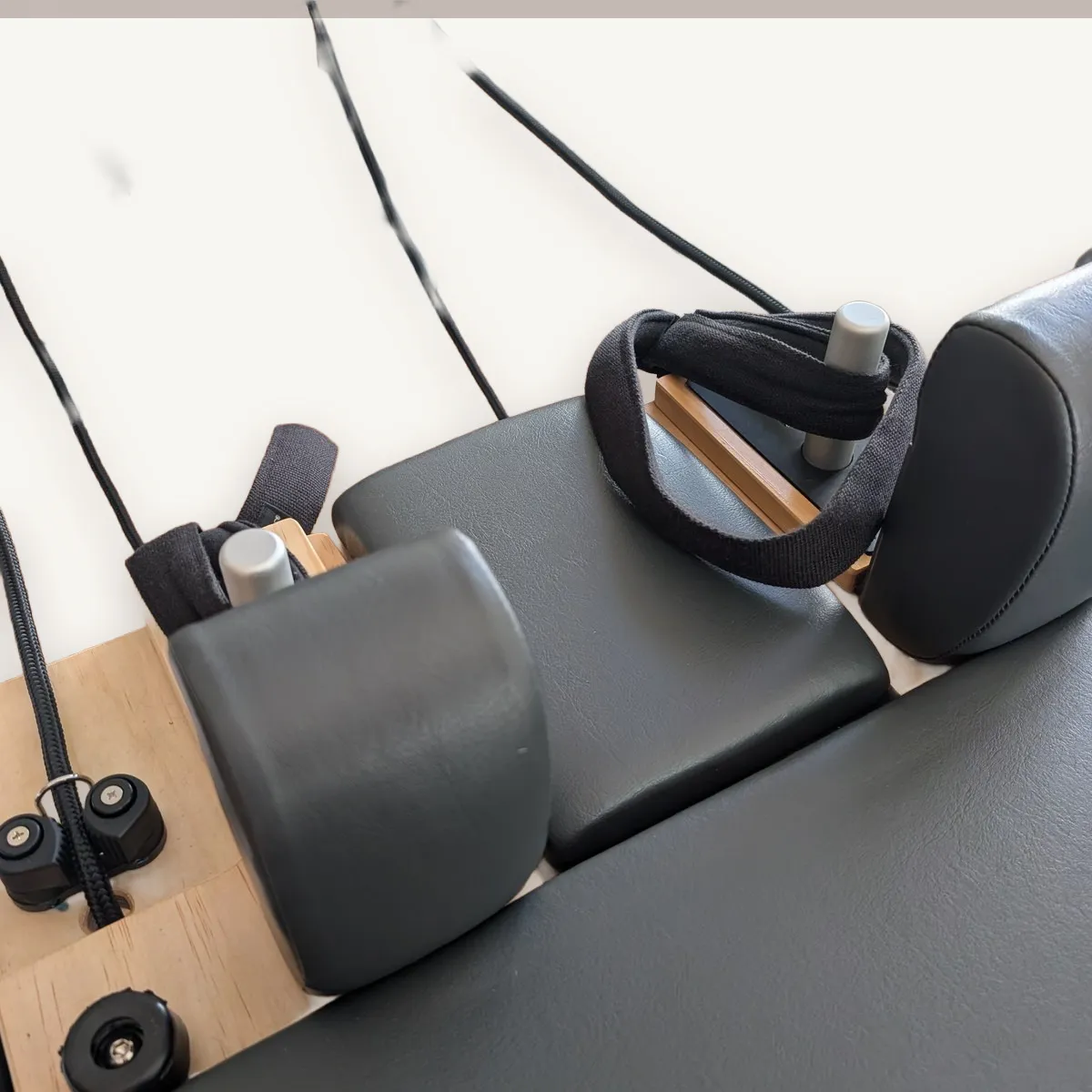 Reformer straps and headrest.